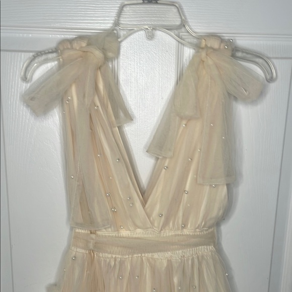 Cream Fit and Flare Mini Dress with Flutter Sleeves - Picture 6 of 9